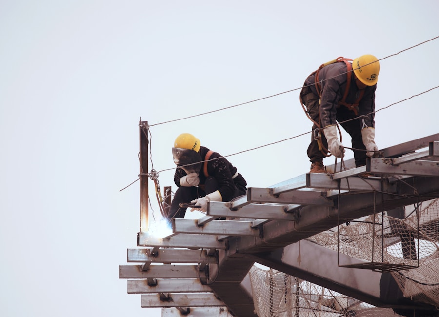 Roofers working on a steep roof structure after a storm